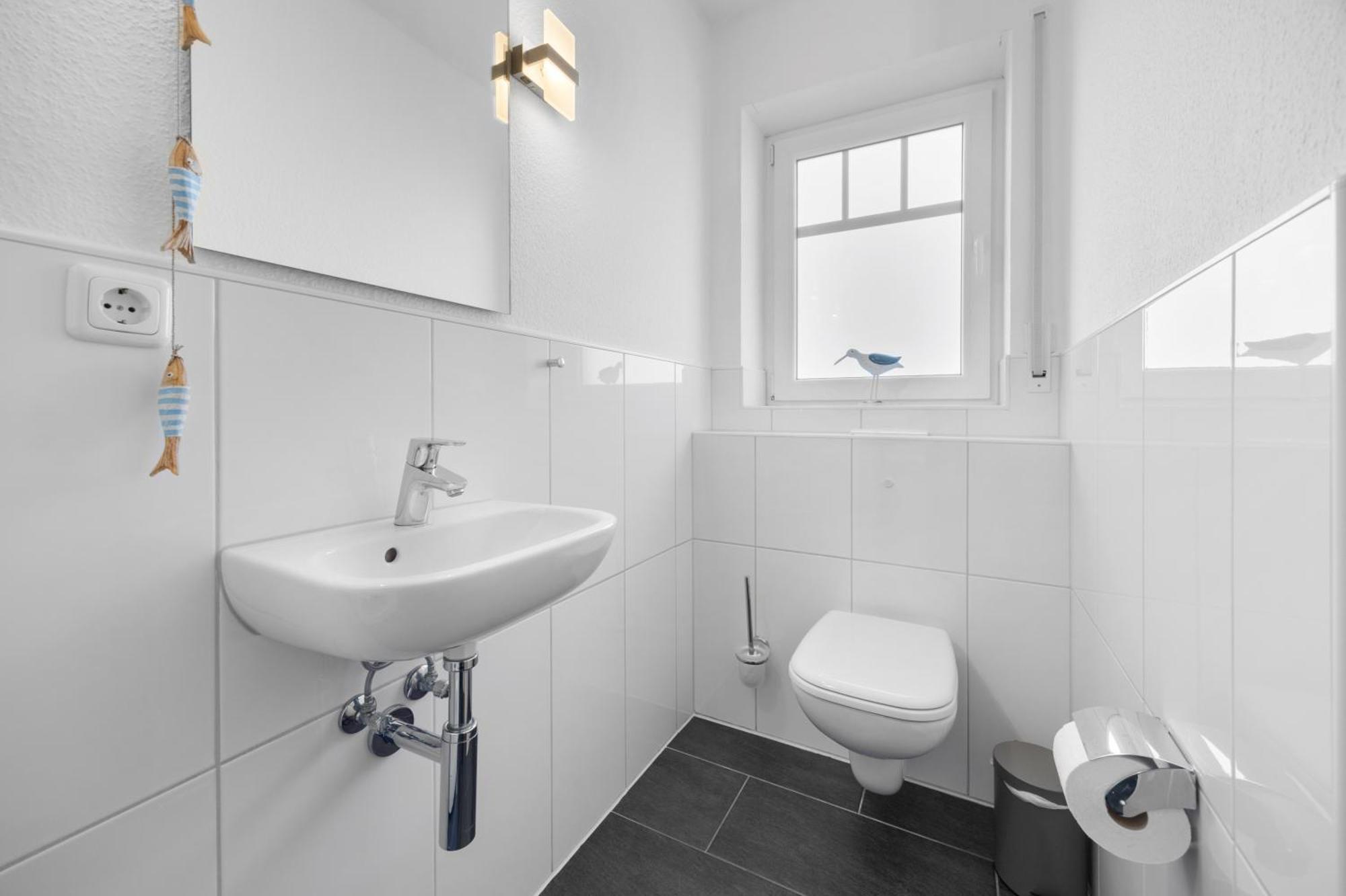 Ferienhaus Wattwurm Hooksiel Esterno foto